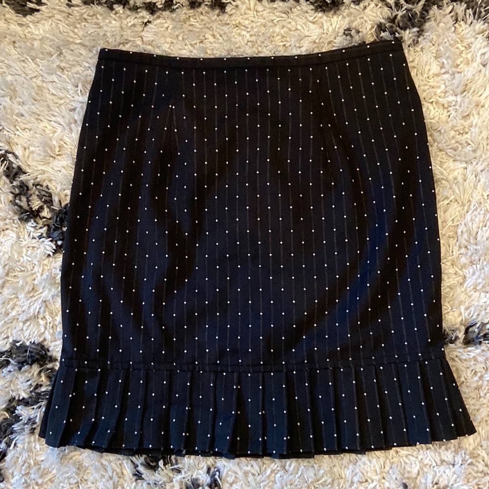 Black ruffle skirt with white polka dots